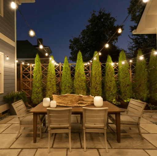 small backyard landscaping ideas - hang string lights